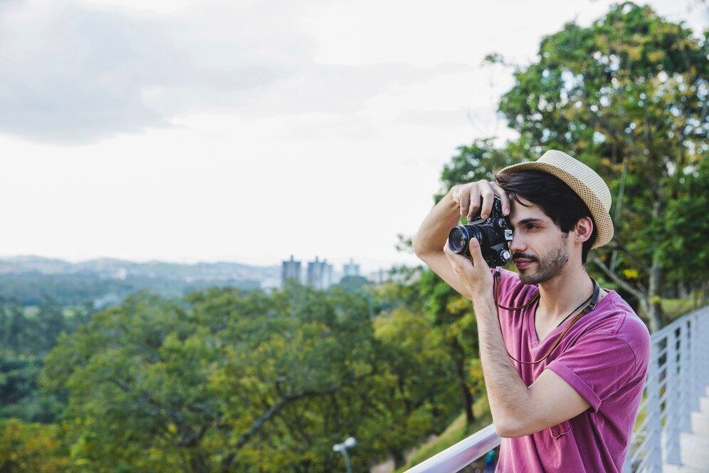 guy taking photo hill_23 2147637745