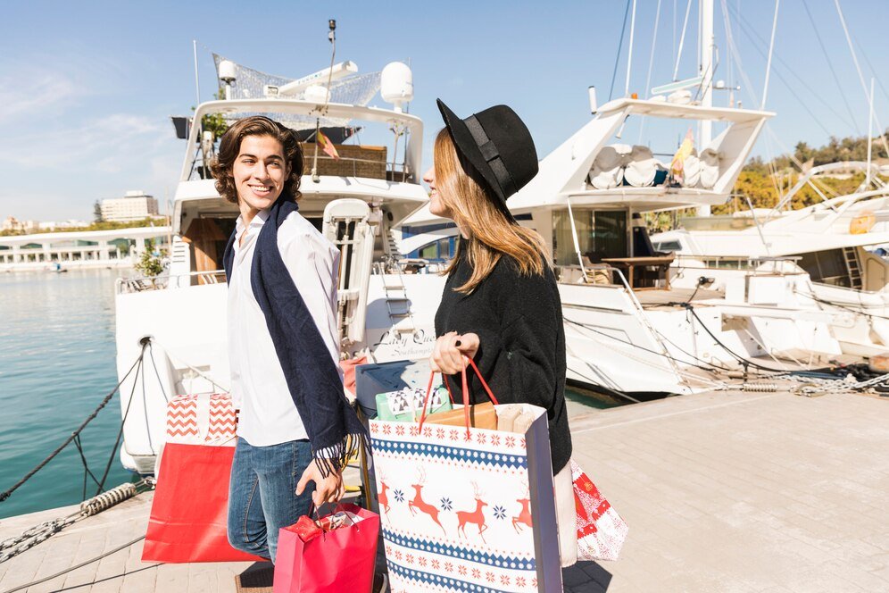 happy couple walking with shopping bags_23 2147979296
