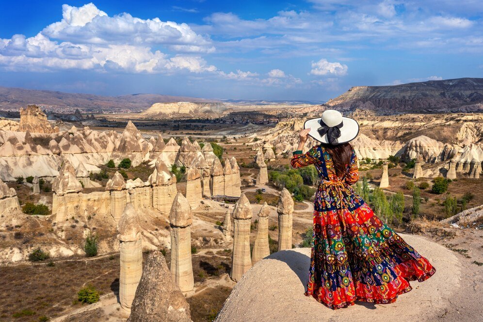 woman bohemian dress standing love valley cappadocia turkey_335224 607